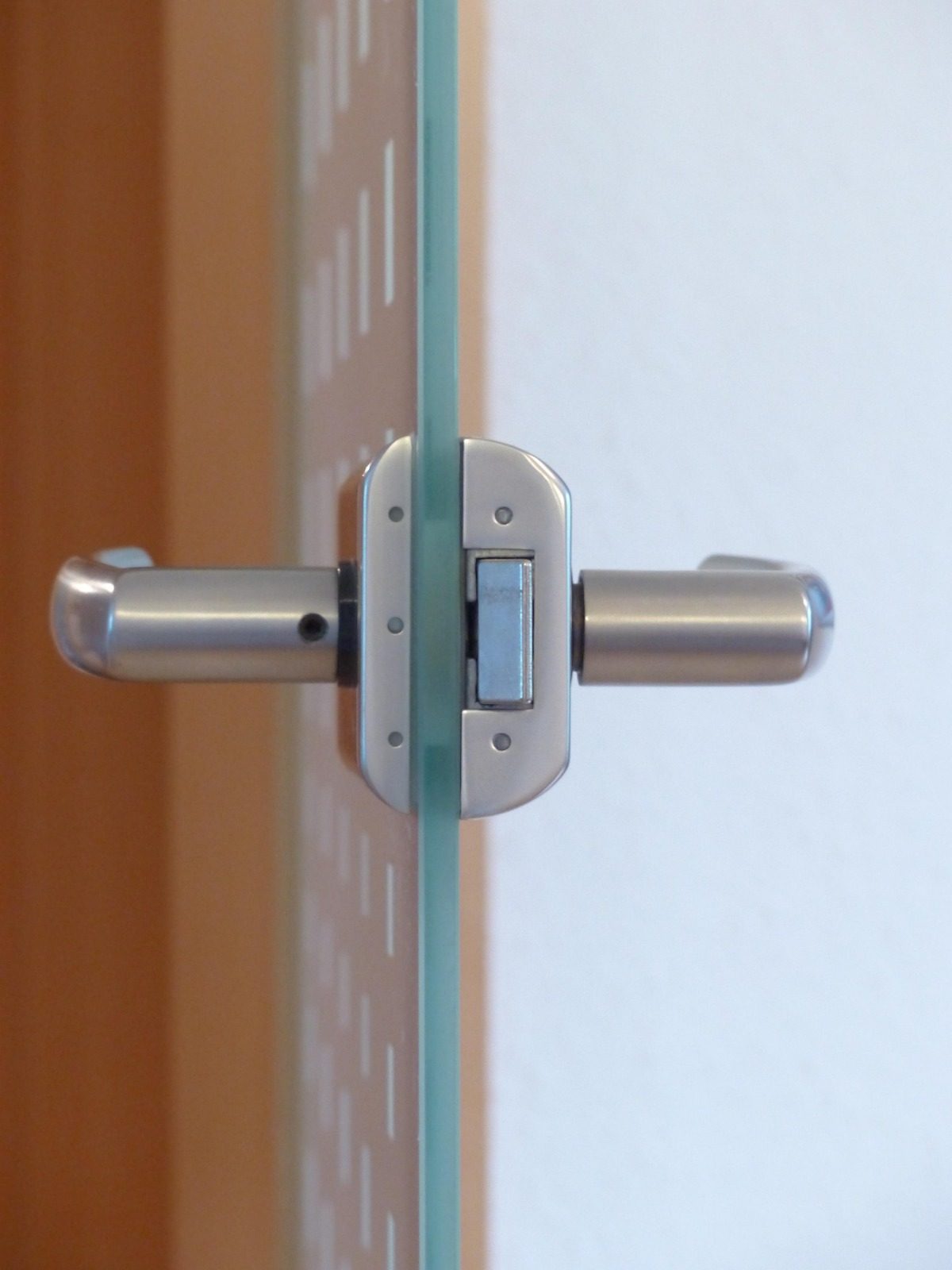 Tempered glazed door hardware detail, frameless fitting