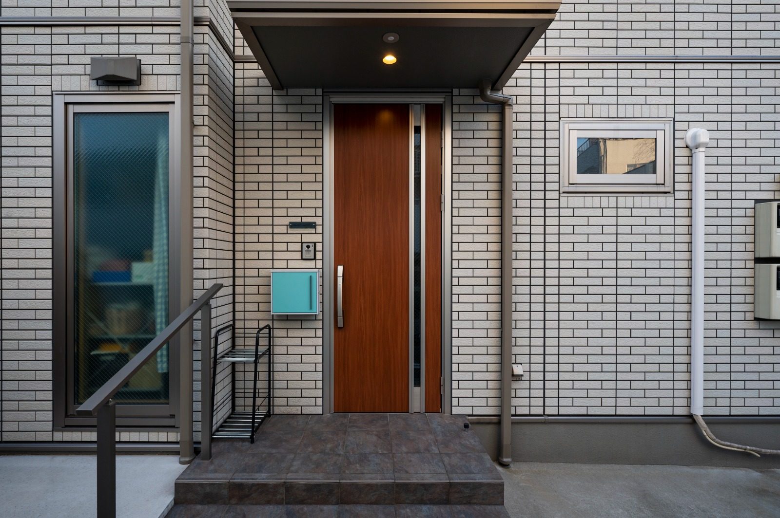 Emergency exit door with panic hardware, sealed finish