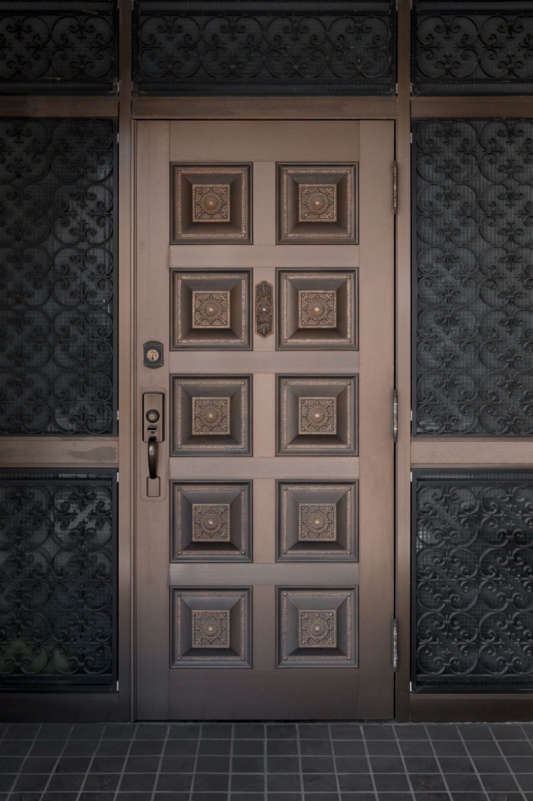 Hand-finished hardware detail on an AMT-engineered door panel